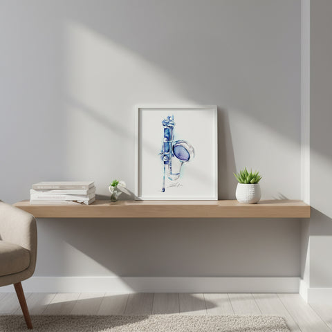 Framed artwork on a wooden shelf with books and plants in a minimalistic room.