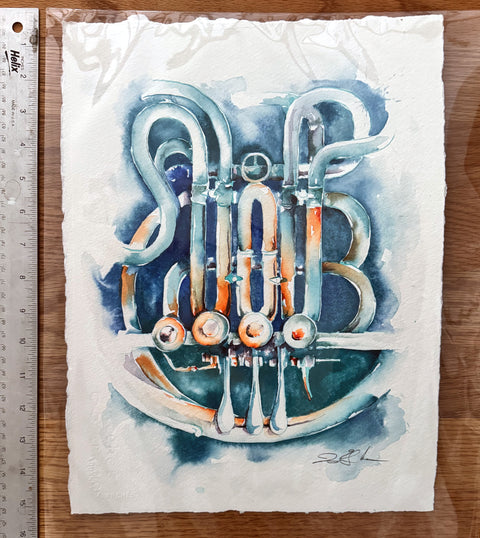 Watercolor painting of a French horn on a wooden surface with a ruler for scale.