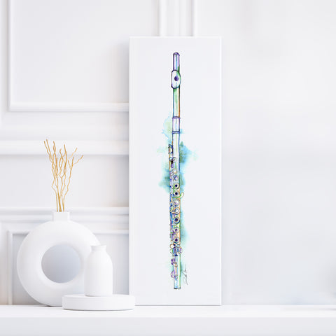 A musical instrument painting depicting a silver flute with blue and purple watercolor effects on a white background, placed on a shelf with a decorative object to the left.