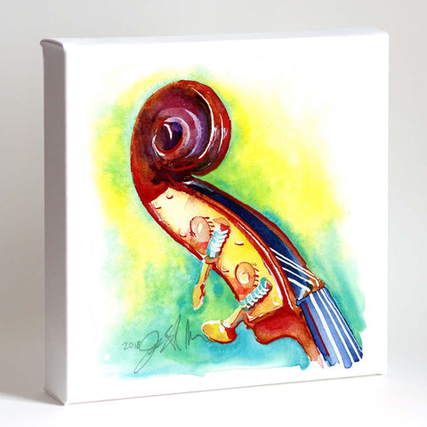 A framed watercolor painting of a bass headstock with a colorful background, displayed on a white wall shelf next to a decorative vase.