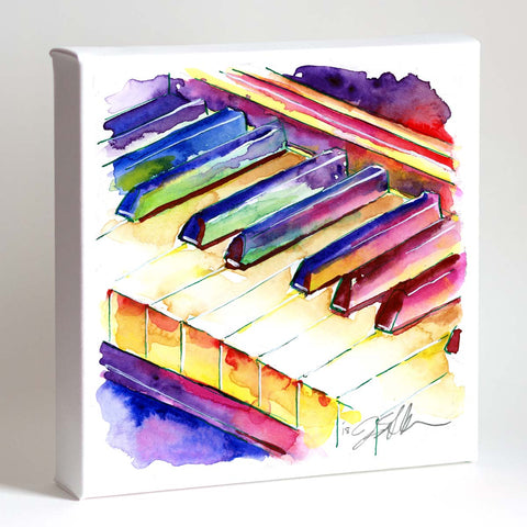 A vibrant watercolor painting of a colorful piano keyboard, with a signature in the lower right corner