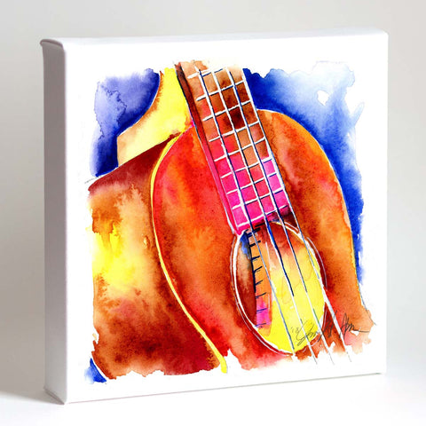 A colorful watercolor painting of a ukulele with a focus on the soundhole, featuring warm sienna and vibrant cobalt blue hues, displayed against a white background