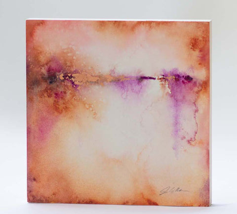 A watercolor painting featuring a blend of pink, purple, and brown colors with copper leaf accents, signed by the artist.