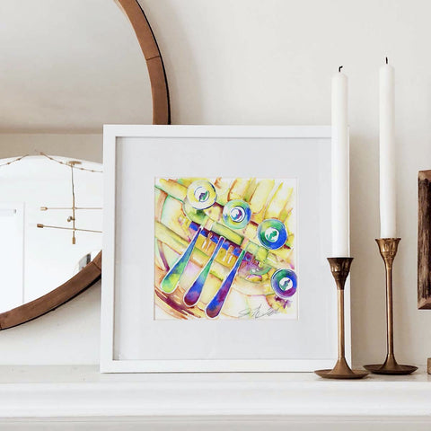 Colorful watercolor painting of French horn keys on a white mantle.