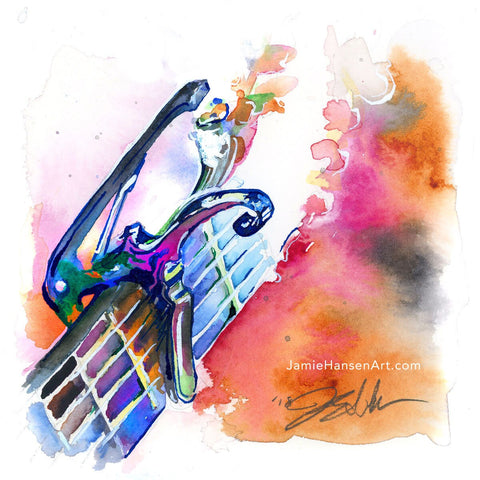 Colorful painting of a capo on a guitar headstock