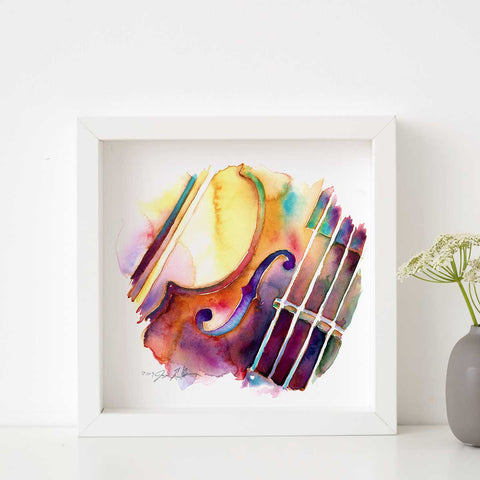 Colorful violin with the painting in a white frame