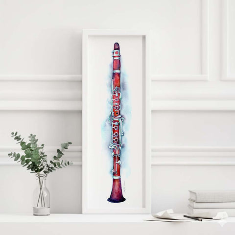 Watercolor of a red clarinet in a white frame with minimal decor