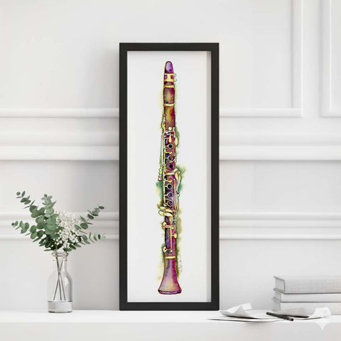 Framed artwork of a colorful clarinet on a white wall with decorative elements.