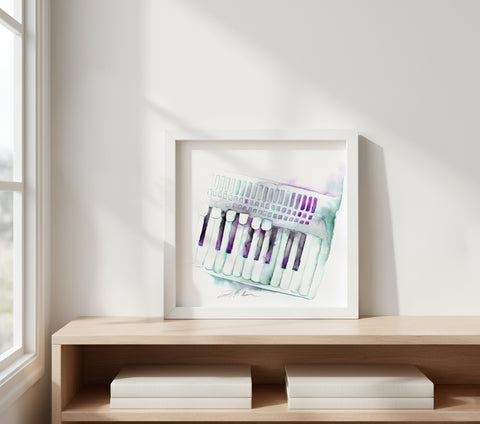 Framed abstract art piece on a wooden shelf with books