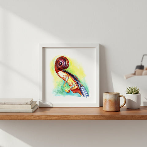 Framed colorful artwork on a wooden shelf with a mug and plant