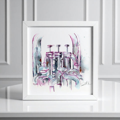 Framed abstract artwork with pink and gray tones on a white surface.