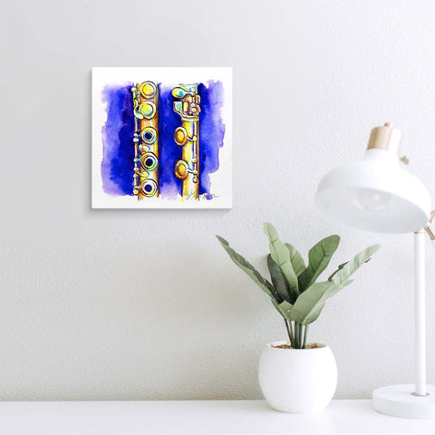Blue and gold painting of a flute on a wall